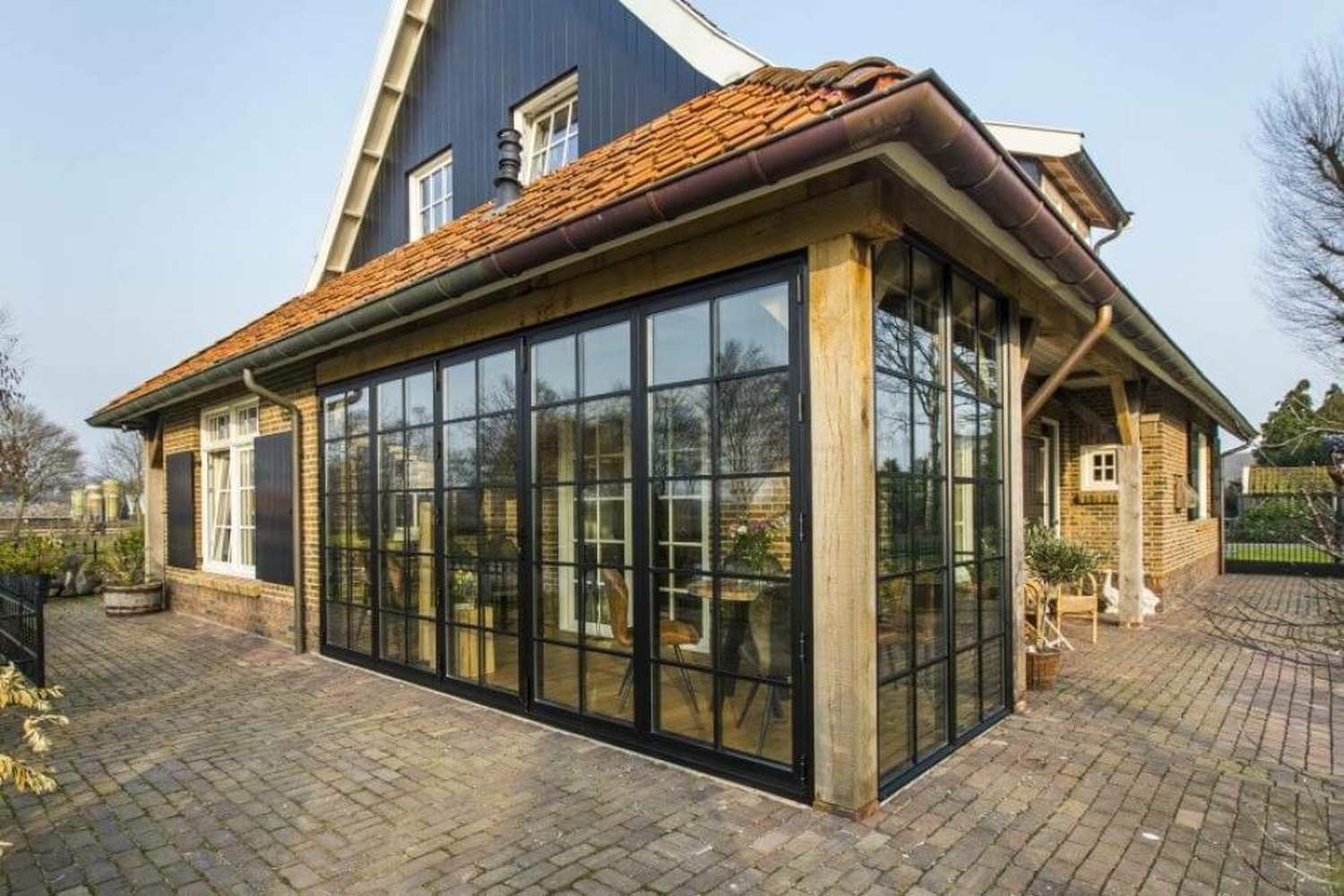 Side 01 Aanbouw glazen pui achterhoek vragender 24 1000x1